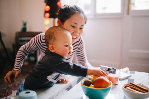 Baby Reaching for Food